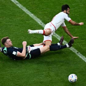 Harry Souttar puts in a crunching tackle during Australia's 1-0 win over Tunisia.