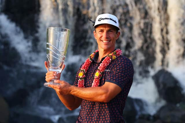 Thorbjorn Olesen poses with the Thailand Classic Trophy after storming to a four-shot success at Amata Spring Country Club. Picture: Thananuwat Srirasant/Getty Images.