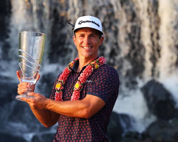 Thorbjorn Olesen poses with the Thailand Classic Trophy after storming to a four-shot success at Amata Spring Country Club. Picture: Thananuwat Srirasant/Getty Images.