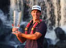 Thorbjorn Olesen poses with the Thailand Classic Trophy after storming to a four-shot success at Amata Spring Country Club. Picture: Thananuwat Srirasant/Getty Images.