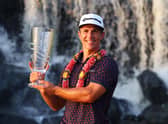 Thorbjorn Olesen poses with the Thailand Classic Trophy after storming to a four-shot success at Amata Spring Country Club. Picture: Thananuwat Srirasant/Getty Images.