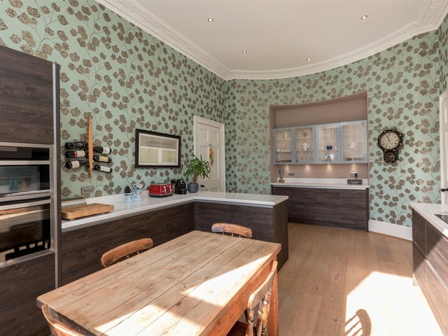 The well appointed breakfasting kitchen, with induction hob and oven.