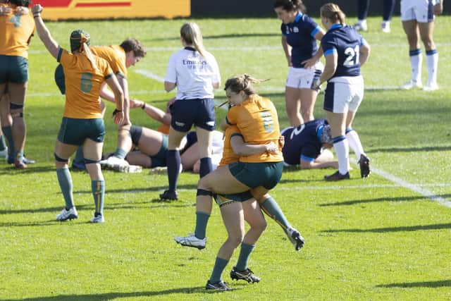 Australia celebrates during their 14-12 win during the Women's Rugby World Cup Pool A match against Scotland.