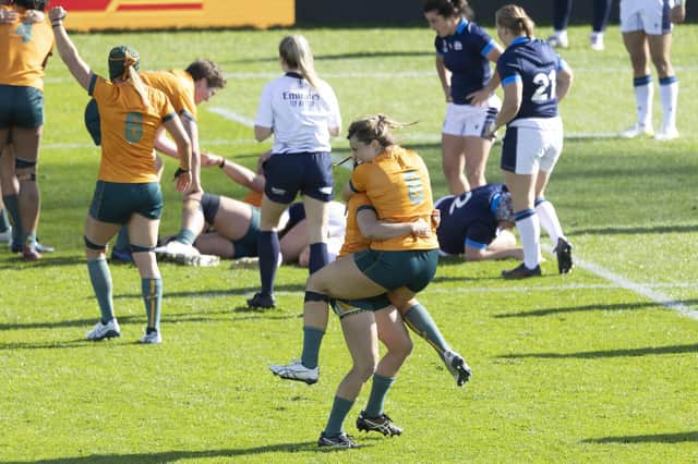 Australia celebrates during their 14-12 win during the Women's Rugby World Cup Pool A match against Scotland.