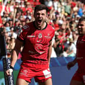 Blair Kinghorn celebrates with Toulouse team-mate Antoine Dupont after scoring his side's fifth try during the win over Exeter Chiefs in the Investec Champions Cup quarter-final at Stade Ernest Wallon on April 14, 2024. (Photo by David Rogers/Getty Images)