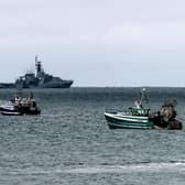 A flotilla of French fishing vessels are seen outside St Helier harbour in Jersey during a protest about post-Brexit changes to fishing in the area (Picture: SWNS)