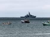 A flotilla of French fishing vessels are seen outside St Helier harbour in Jersey during a protest about post-Brexit changes to fishing in the area (Picture: SWNS)