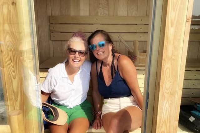Judith Dunlop (on right) with friend in sauna