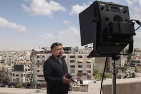 An Al Jazeera English correspondent reports live from Ramallah in the occupied West Bank on Sunday. Israel's Prime Minister said his government has decided to shut down the Qatar-based news channel Al Jazeera, with which his administration has had a long-running feud. Picture: AFP via Getty Images