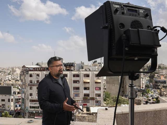 An Al Jazeera English correspondent reports live from Ramallah in the occupied West Bank on Sunday. Israel's Prime Minister said his government has decided to shut down the Qatar-based news channel Al Jazeera, with which his administration has had a long-running feud. Picture: AFP via Getty Images