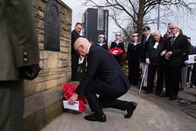 First Minister John Swinney lays a wreath to mark the sacrifice made by his uncle Thomas Peck Hunter during a Royal Marine Commandos memorial service at the Hunter Memorial in Leith, Edinburgh, yesterday (Picture: Andrew Milligan/PA Wire)