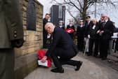 First Minister John Swinney lays a wreath to mark the sacrifice made by his uncle Thomas Peck Hunter during a Royal Marine Commandos memorial service at the Hunter Memorial in Leith, Edinburgh, yesterday (Picture: Andrew Milligan/PA Wire)