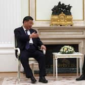 Russian President Vladimir Putin meets with China's President Xi Jinping at the Kremlin in Moscow on Monday. Picture: Sergei Karpuhkin/AFP via Getty Images)