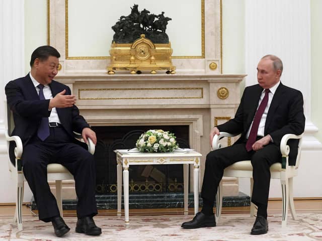 Russian President Vladimir Putin meets with China's President Xi Jinping at the Kremlin in Moscow on Monday. Picture: Sergei Karpuhkin/AFP via Getty Images)