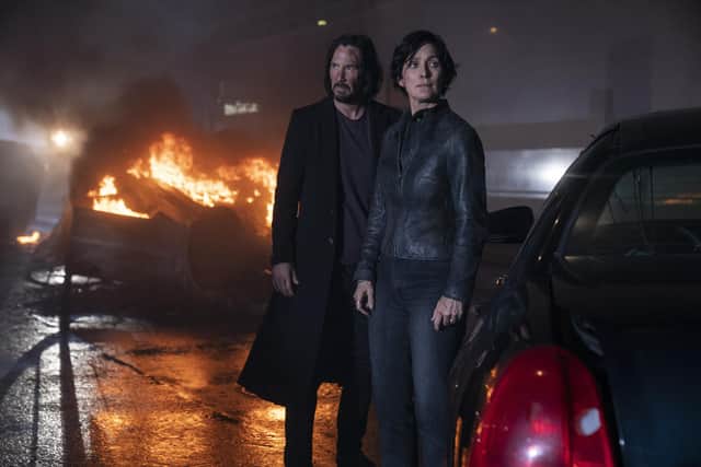 Keanu Reeves and Carrie Anne-Moss return in The Matrix Resurrections. Picture: Warner Bros