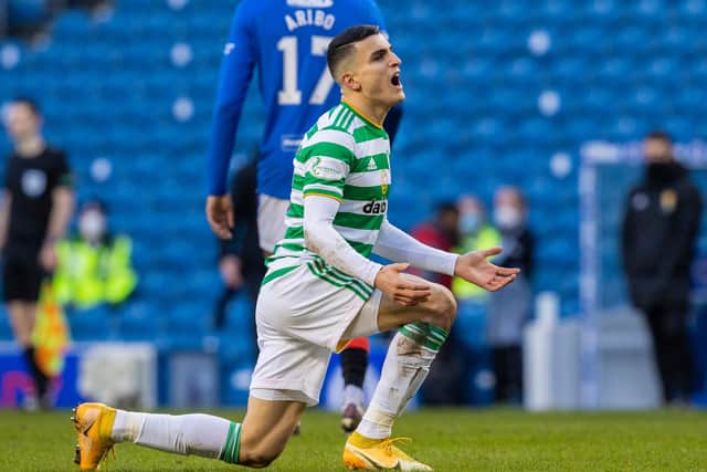Celtic sub Mohamed Elyounoussi reacts after missing a late chance at Ibrox. Picture: SNS