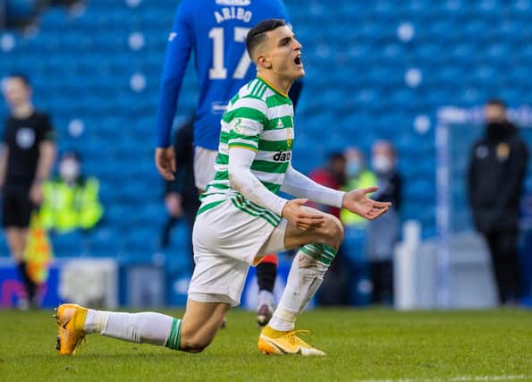Celtic sub Mohamed Elyounoussi reacts after missing a late chance at Ibrox. Picture: SNS