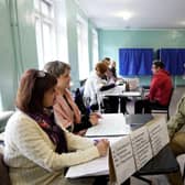 Konstantin Ivashchenko, former CEO of the Azovmash plant and appointed pro-Russian mayor of Mariupol, visits a polling station as people vote in a referendum in Mariupol.