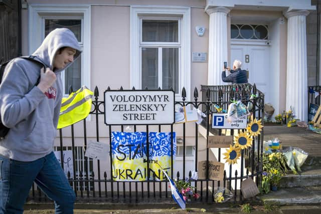 Locals have left messages of support and flowers outside the Ukraine Consulate in Edinburgh. (Photo credit: Jane Barlow/PA Wire)