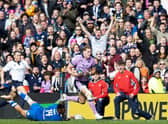 Scotland's Duhan van Der Merwe strides forward before playing the pass to Blair Kinghorn to score the last try of the match against Italy.