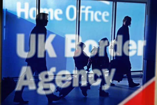People who move to the UK pay much higher fees and costs than those who migrate to countries like Germany and Australia (Picture: Jeff J Mitchell/Getty Images)