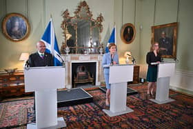 Former first minister Nicola Sturgeon and Scottish Greens co-leaders Patrick Harvie and Lorna Slater announce the Bute House Agreement in 2021. Picture: Jeff J Mitchell/pool/AFP via Getty Images