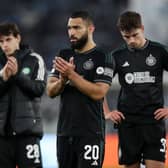 Cameron Carter-Vickers of Celtic acknowledges the fans with teammates following the 2-0 defeat to Lazio.