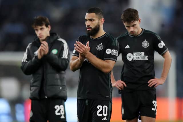 Cameron Carter-Vickers of Celtic acknowledges the fans with teammates following the 2-0 defeat to Lazio.
