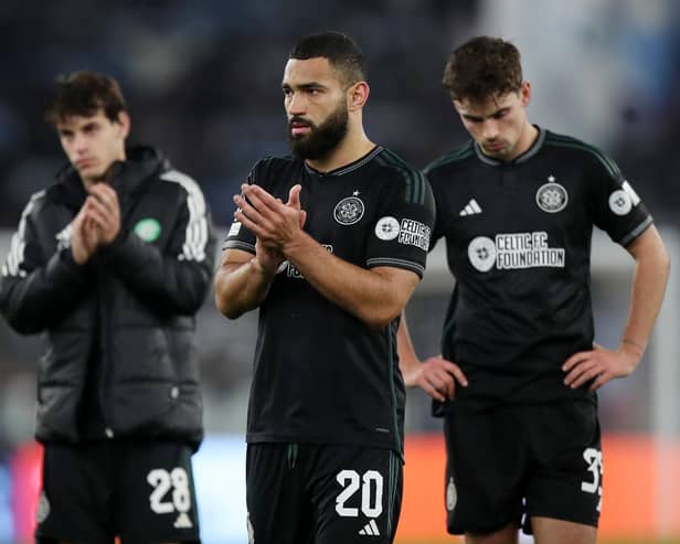Cameron Carter-Vickers of Celtic acknowledges the fans with teammates following the 2-0 defeat to Lazio.