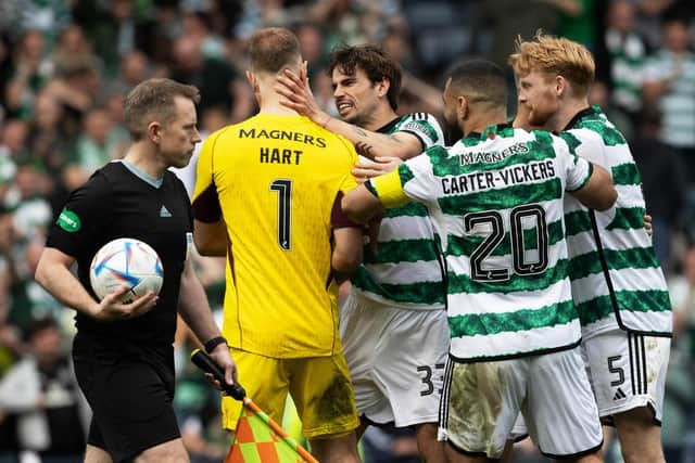 Celtic's Joe Hart celebrates with Cameron Carter-Vickers, Liam Scales and Matt O'Riley after winning the shootout against Aberdeen.