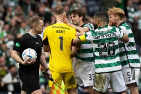 Celtic's Joe Hart celebrates with Cameron Carter-Vickers, Liam Scales and Matt O'Riley after winning the shootout against Aberdeen.