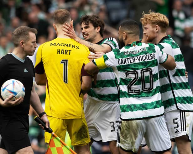 Celtic's Joe Hart celebrates with Cameron Carter-Vickers, Liam Scales and Matt O'Riley after winning the shootout against Aberdeen.