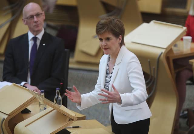 Nicola Sturgeon and other leading SNP figures have accused Boris Johnson's Government of a 'power grab' that threatens devolution (Picture: Fraser Bremner - WPA Pool/Getty Images)