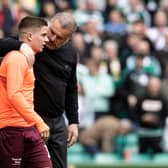 Celtic manager Ange Postecoglou has a word with Hearts' Cammy Devlin after a match last season.  (Photo by Alan Harvey / SNS Group)