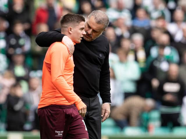 Celtic manager Ange Postecoglou has a word with Hearts' Cammy Devlin after a match last season.  (Photo by Alan Harvey / SNS Group)