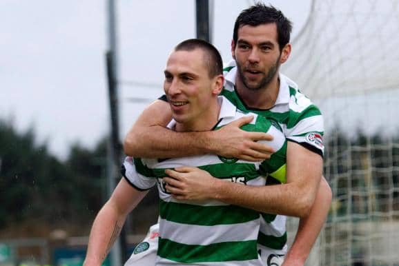 Celtic captain Scott Brown celebrates with team-mate Joe Ledley back in 2012. Both are among ITV analysts for Euro 2020. (Picture: SNS)