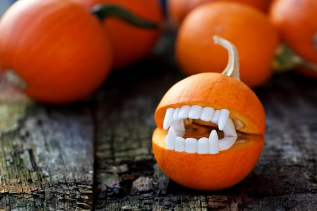 Another efficient design if you've got leftover Halloween props lying around. All you have to do is hollow out an average mouth shape on your pumpkin then slot those plastic dentures in - the result is fang'tastic (couldn't resist) and you lose very little time creating it.