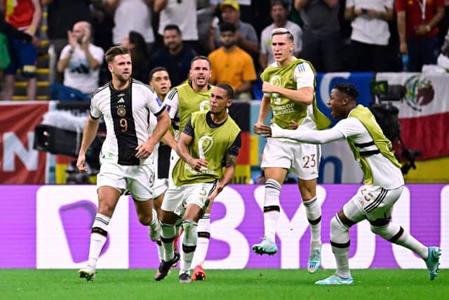 Niclas Fullkrug celebrates Germany's equaliser against Spain.