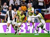 Niclas Fullkrug celebrates Germany's equaliser against Spain.