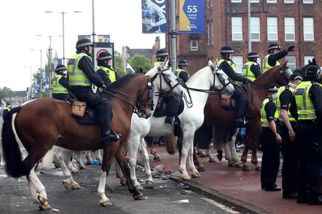 Police and Rangers fans outside the ground before the Scottish Premiership match at Ibrox Stadium, Glasgow. Picture: Robert Perry.