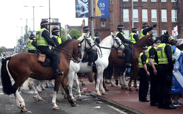 Police and Rangers fans outside the ground before the Scottish Premiership match at Ibrox Stadium, Glasgow. Picture: Robert Perry.