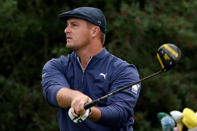 Bryson DeChambeau plays his shot from the 18th tee during the second round of the Masters at Augusta National/ Jamie Squire/Getty Images