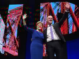First Minister Nicola Sturgeon alongside Deputy First Minister John Swinney after his speech at the SNP conference at The Event Complex Aberdeen (TECA) in Aberdeen , Scotland.