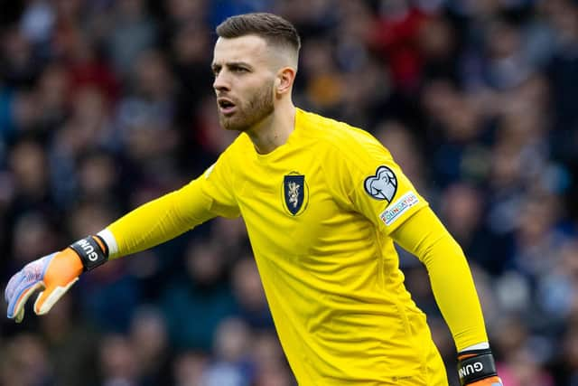 Angus Gunn made his debut in goal for Scotland.