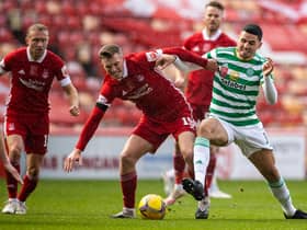 Aberdeen's Lewis Ferguson challenged by Tom Rogic in last week's 3-3 draw between the Scottish Cup semi-finalists in which the Pittodire midfielder netted twice from the spot (Photo by Craig Williamson / SNS Group)