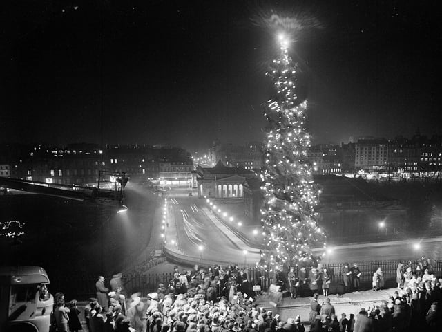 Christmas Tree at Mound - Lights switched on by 8 year-old Thomas Forrest. General View - As children sing Christmas carols 1959