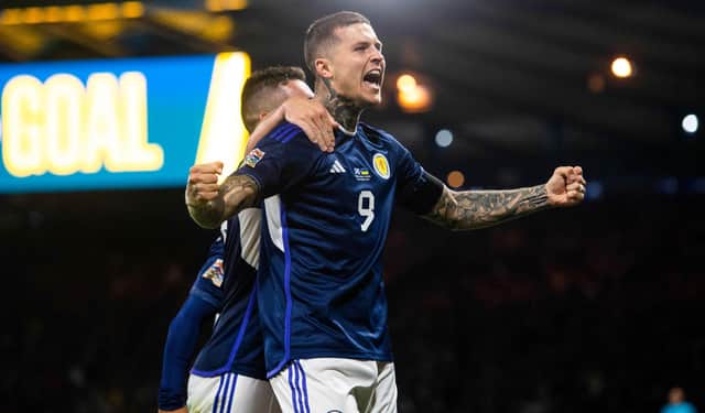 Scotland striker Lyndon Dykes has been taken to hospital.