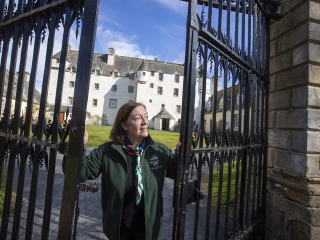 Gates to Traquair are opened by Gillian Steele.
