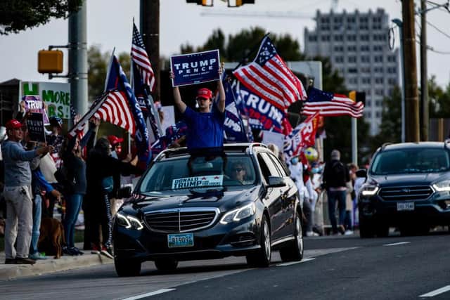 Hundreds of Trump supporters that have gathered outside the hospital since the President's admission. (Photo by Samuel Corum/Getty Images)