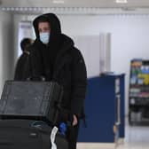 Central defender Jack Simpson arrives at Glasgow Airport on Monday before completing his move from Bournemouth to Rangers.  (Photo by Ross MacDonald / SNS Group)